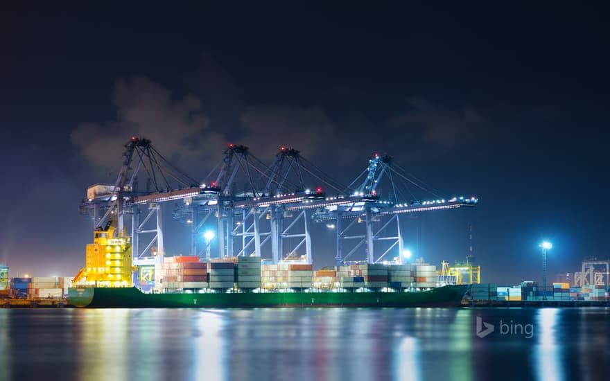 Cranes moving cargo at Laem Chabang Port, Thailand