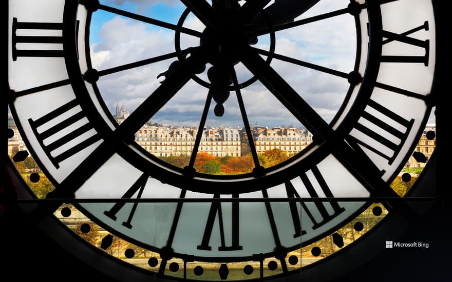 View of Paris through the giant clock of the Musée d'Orsay, Paris